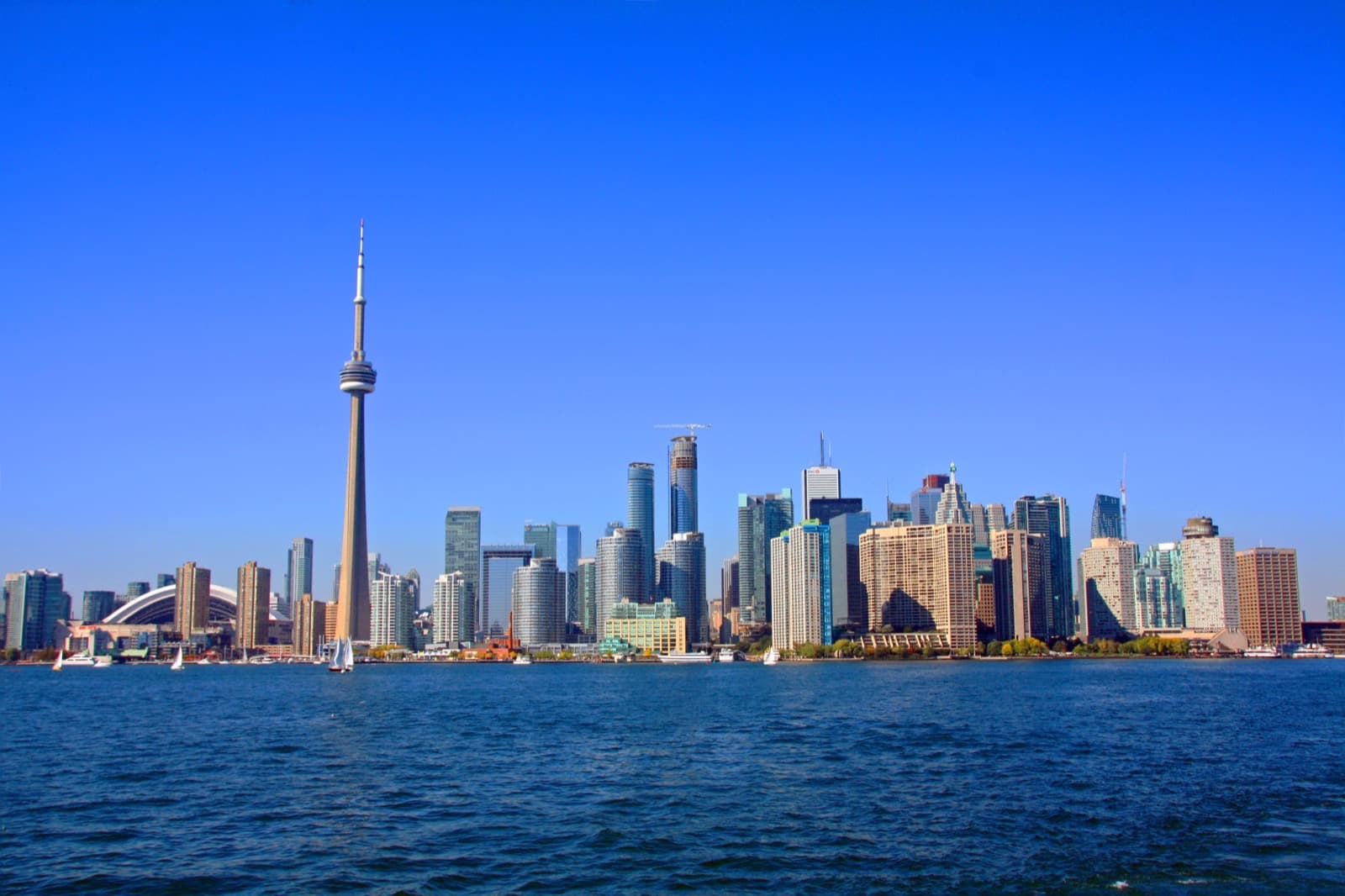 Toronto skyline of downtown skyscrapers seen across the water in daylight